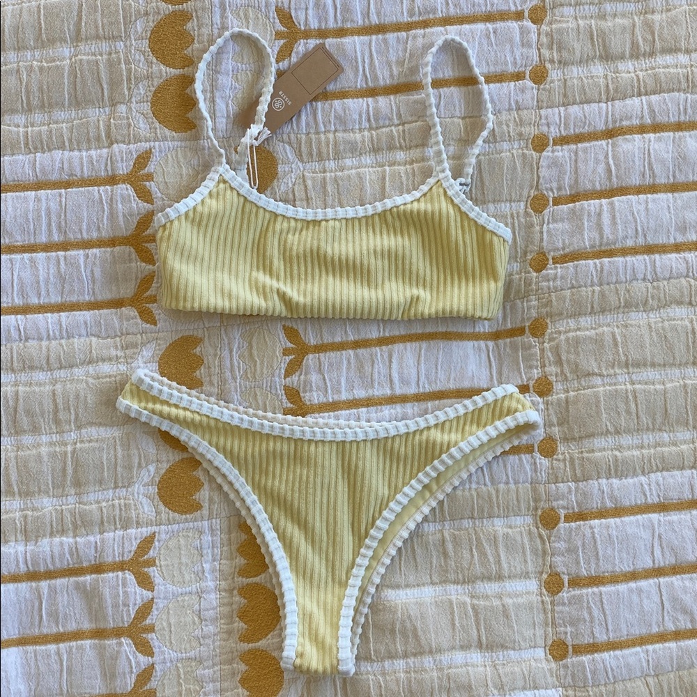 New Yellow Ribbed Bikini Set with White Trim . Never worn.